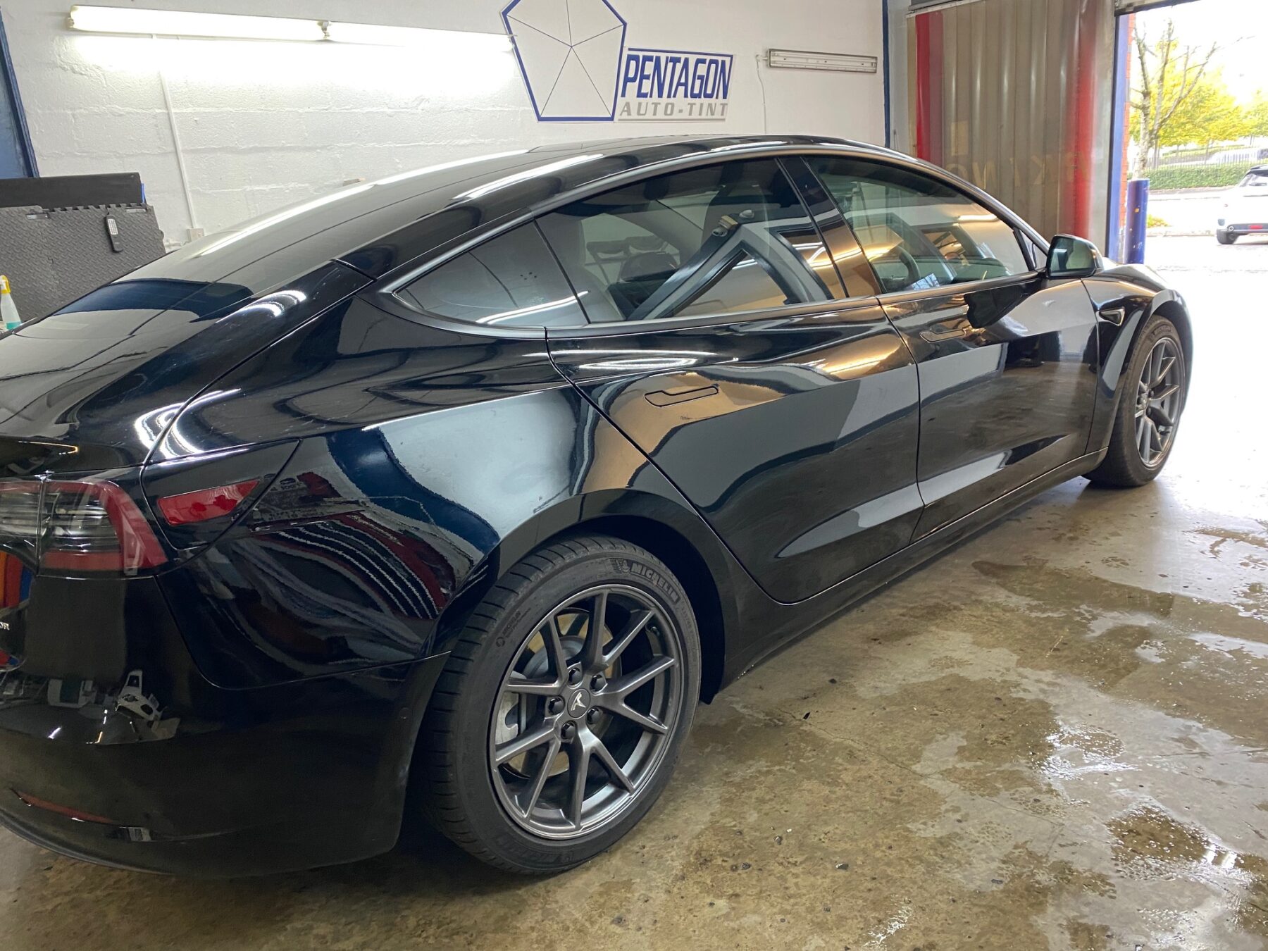 Black Tesla showing of new supaglass un Glasgow