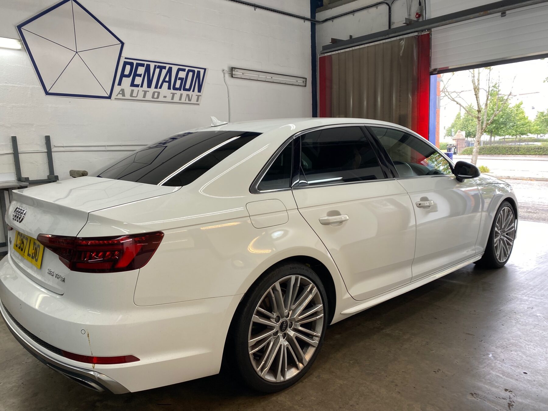White Audi A4 with new tinted glass windows in Glasgow