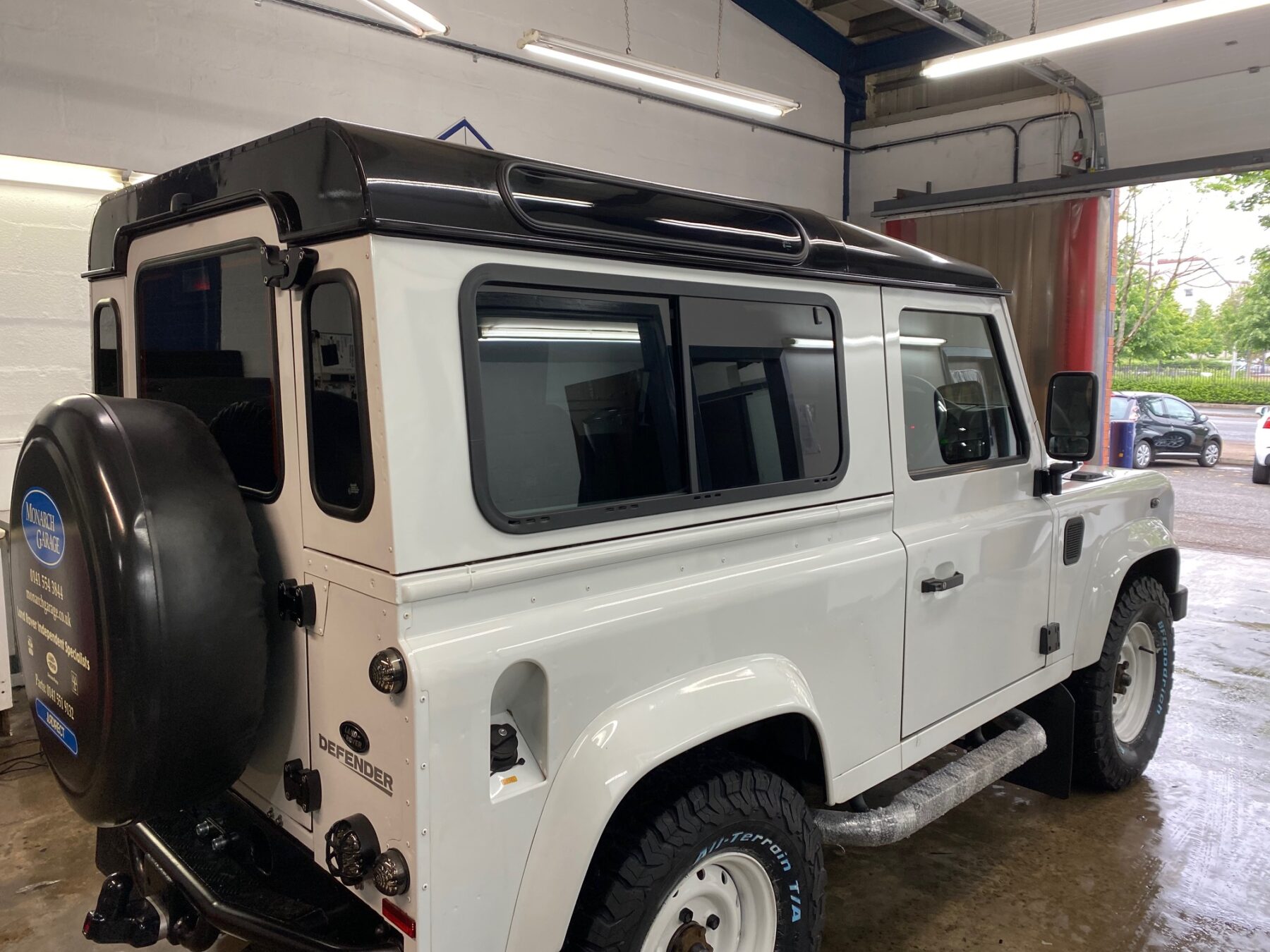 Defender with new glass windows in Glasgow