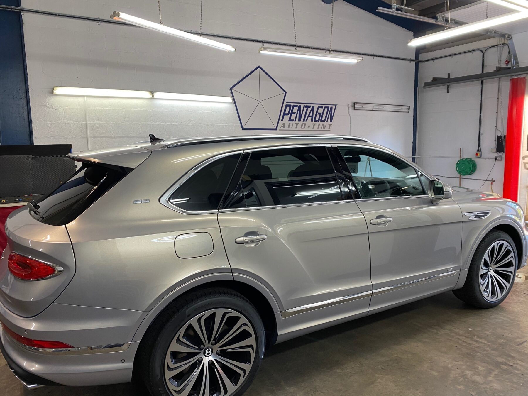 Grey Bentley van with new tinted windows in Glasgow